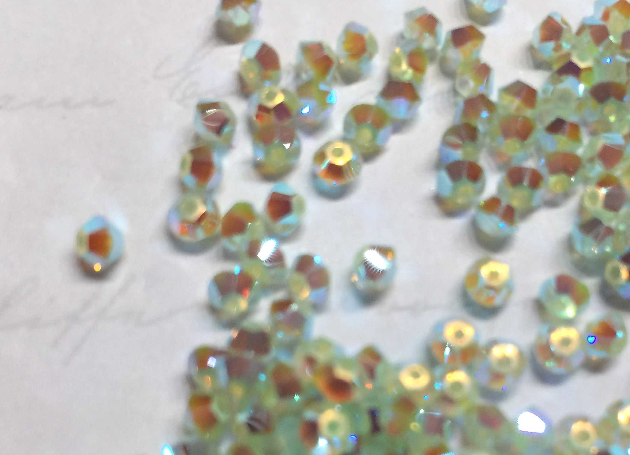 Bild: 5328 - Chrysolite Opal 2AB (294) - 3mm (L)